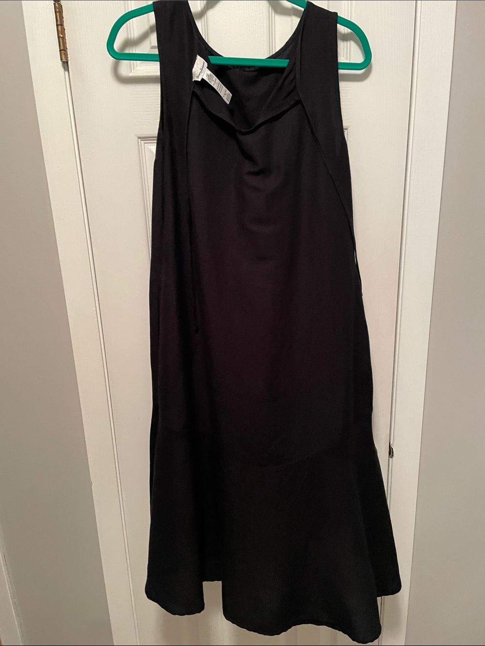 Like new Tommy Bahama size medium black dress with pocket